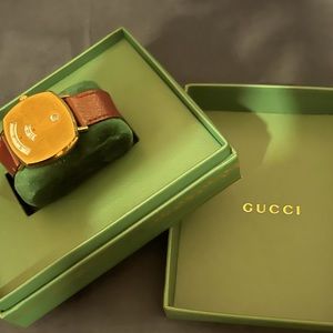 Gucci Men's Grip
Yellow Gold PVD Bordeaux Leather